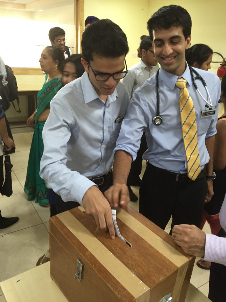 Srineil Vuthaluru and Pranav Mishra cast their ballots in the first fully democratic KMC Student Council elections (Feb 2016)
